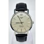 A Rare Vintage Longine Automatic Flagship Watch. Not many of these were made with the date window at