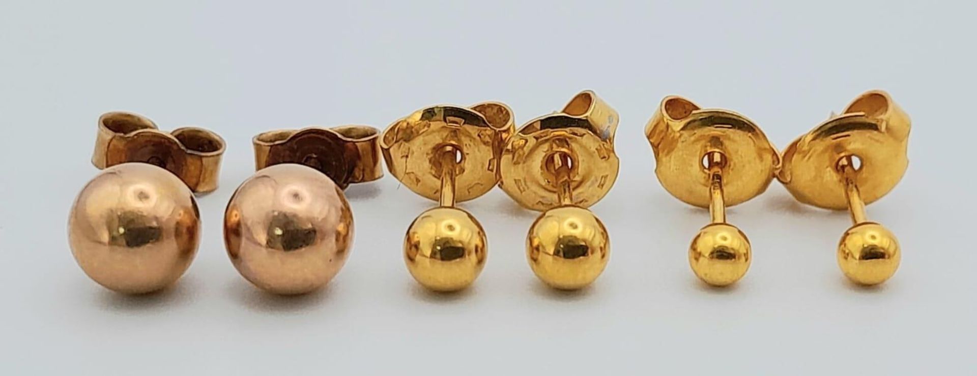 Three Pairs of 9K Yellow Gold Ball Stud Earrings. 2.34g total weight.