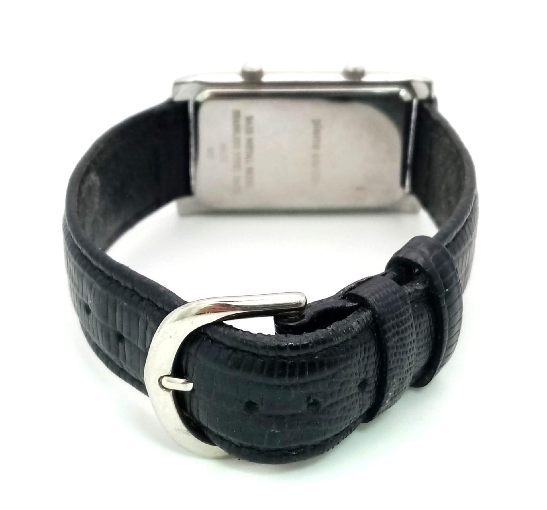 A Vintage Pierre Cardin Dual Time Quartz Watch. Black leather strap. Elongated case. In working - Image 4 of 6