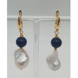 Lovely pair of Lapis and Baroque Pearl pendant earrings.