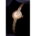 A Vintage Tudor 9K Gold Ladies Watch. 9K gold bracelet and case - 17mm. Mechanical movement. In
