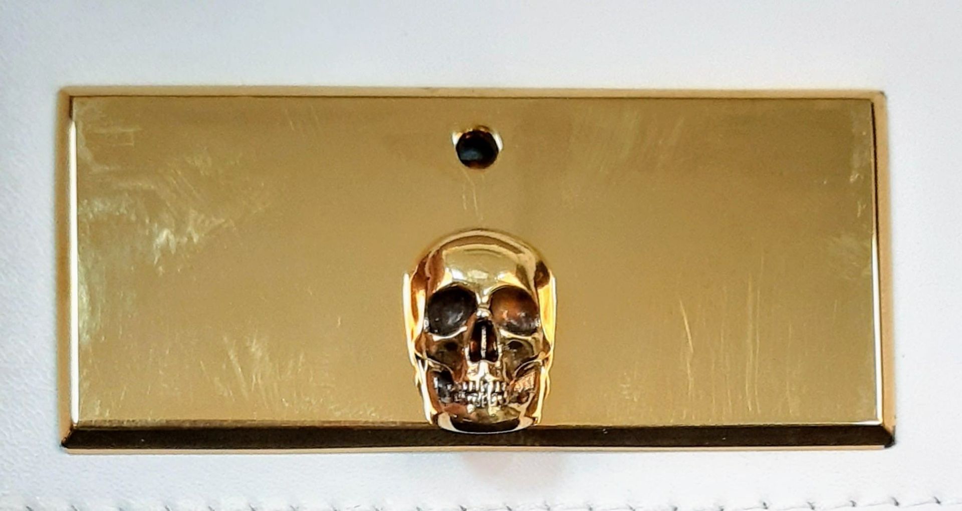 An Alexander McQueen Deep Ivory Leather Clutch Bag with Gold Skull Detail. Beige Suede Interior, - Image 4 of 9