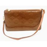 A Louis Vuitton Vernis Pochette Shoulder Bag in Copper, Emboss LV Detailing, Dark Tan Leather Strap.