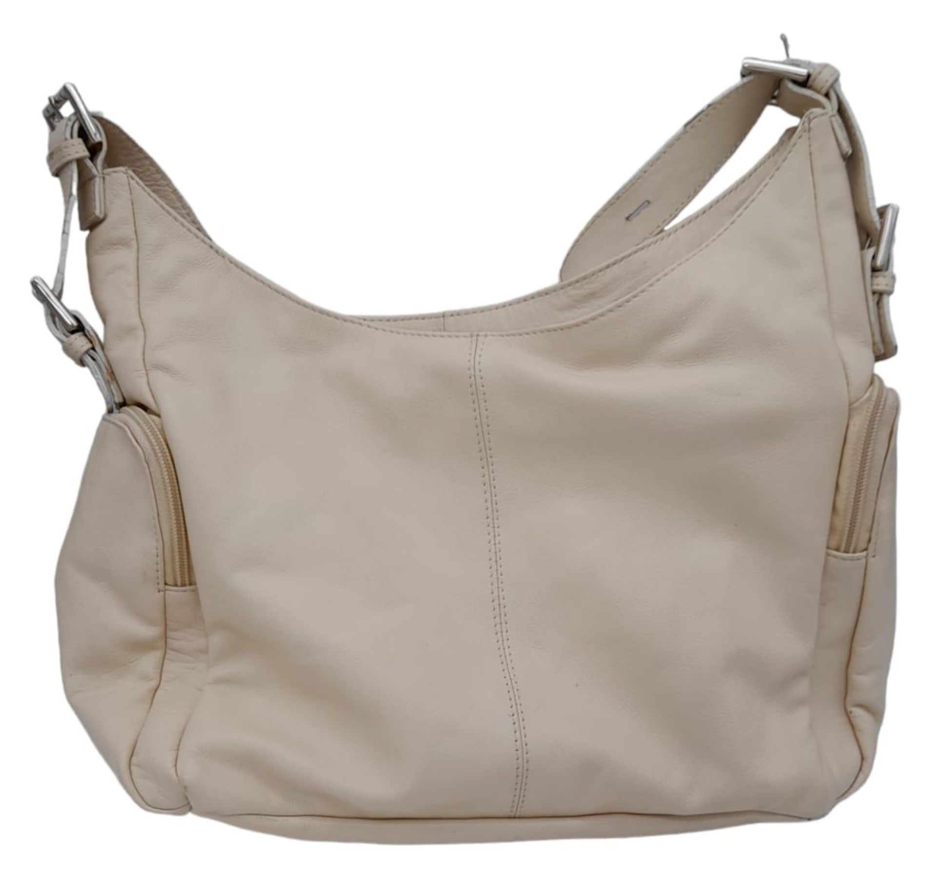 An Azure Beige Leather Handbag. Beige leather exterior with three zipped compartments. Purple - Image 4 of 8