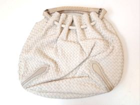 A BOTTEGA VENETA SOFT CREAM LEATHER HOBO BAG. COMES WITH INTERIOR ZIPPED COMPARTMENT AND PHONE