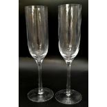 A Pair of Tiffany and Co. Champagne Flutes. 23cm tall.