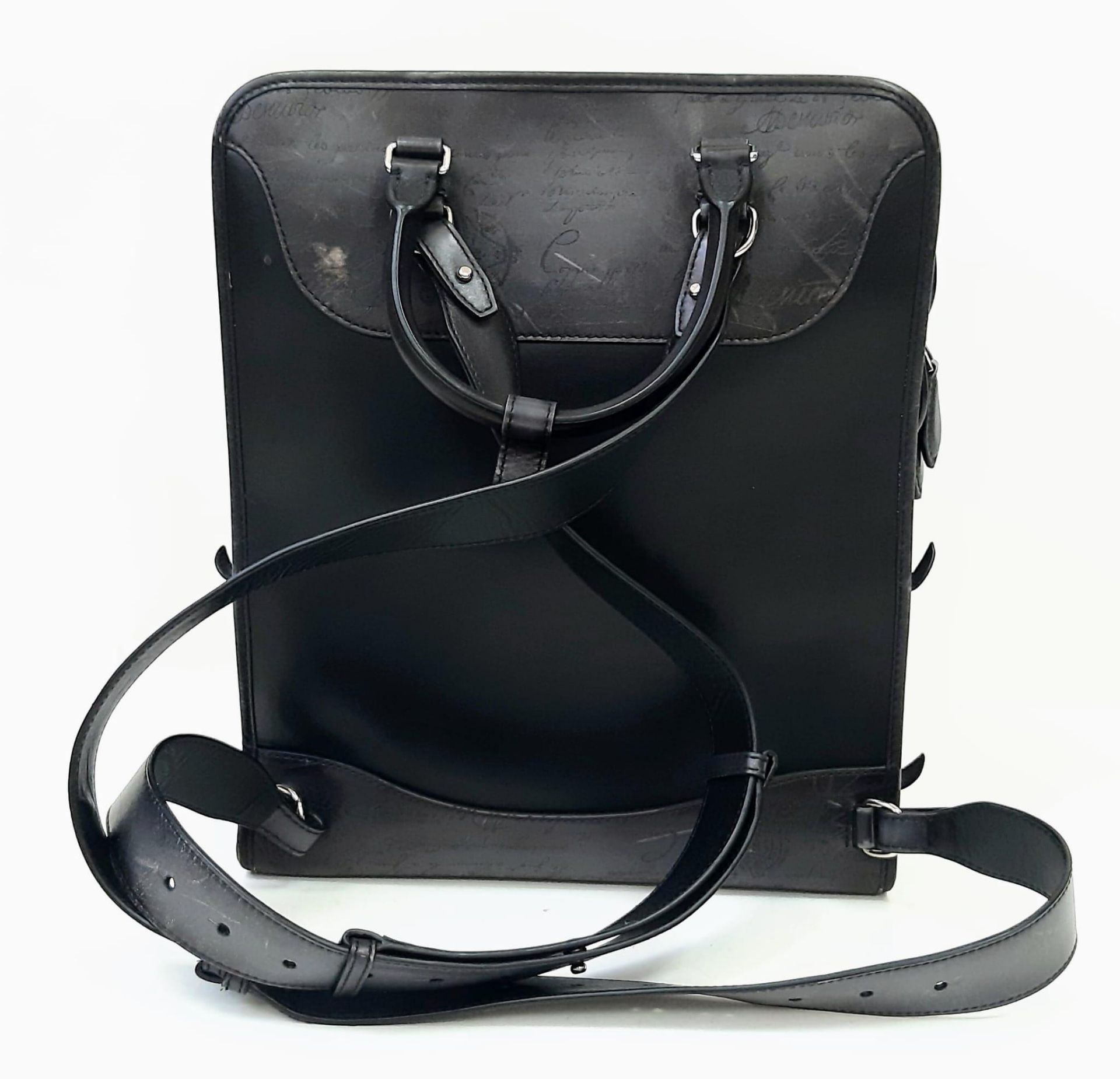 A Berluti Black Leather Satchel. Exterior in scritto leather design with zipped pocket. Spacious - Image 3 of 6