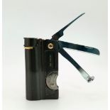 A vintage, probably 90s, WINJET INTERNATIONAL pipe lighter with tools in original green velvet