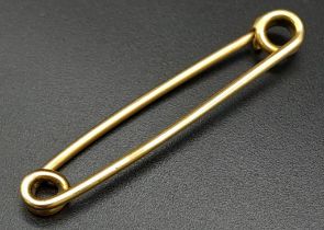An Antique 15K Gold Safety Pin Brooch. 4cm. 2.4g