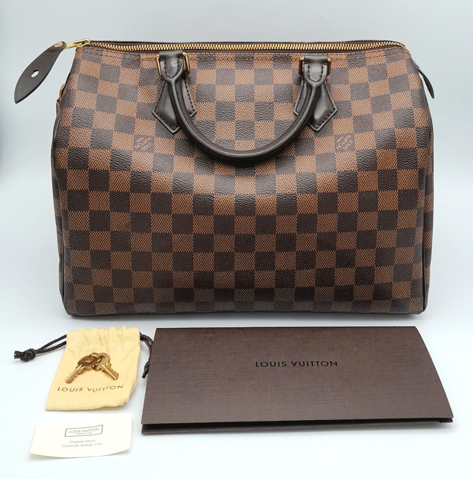 A Louis Vuitton Speedy 30 ebony damier canvas Handbag. Accessories to include padlock and key. - Image 6 of 7