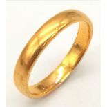 A 22K GOLD BAND RING . 3.99gms size O