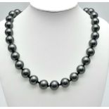 A South Sea Pearl Metallic Grey Shell Bead Necklace. 12mm beads. Necklace length - 44cm