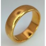 A 22K GOLD BAND RING . 7.5gms size M