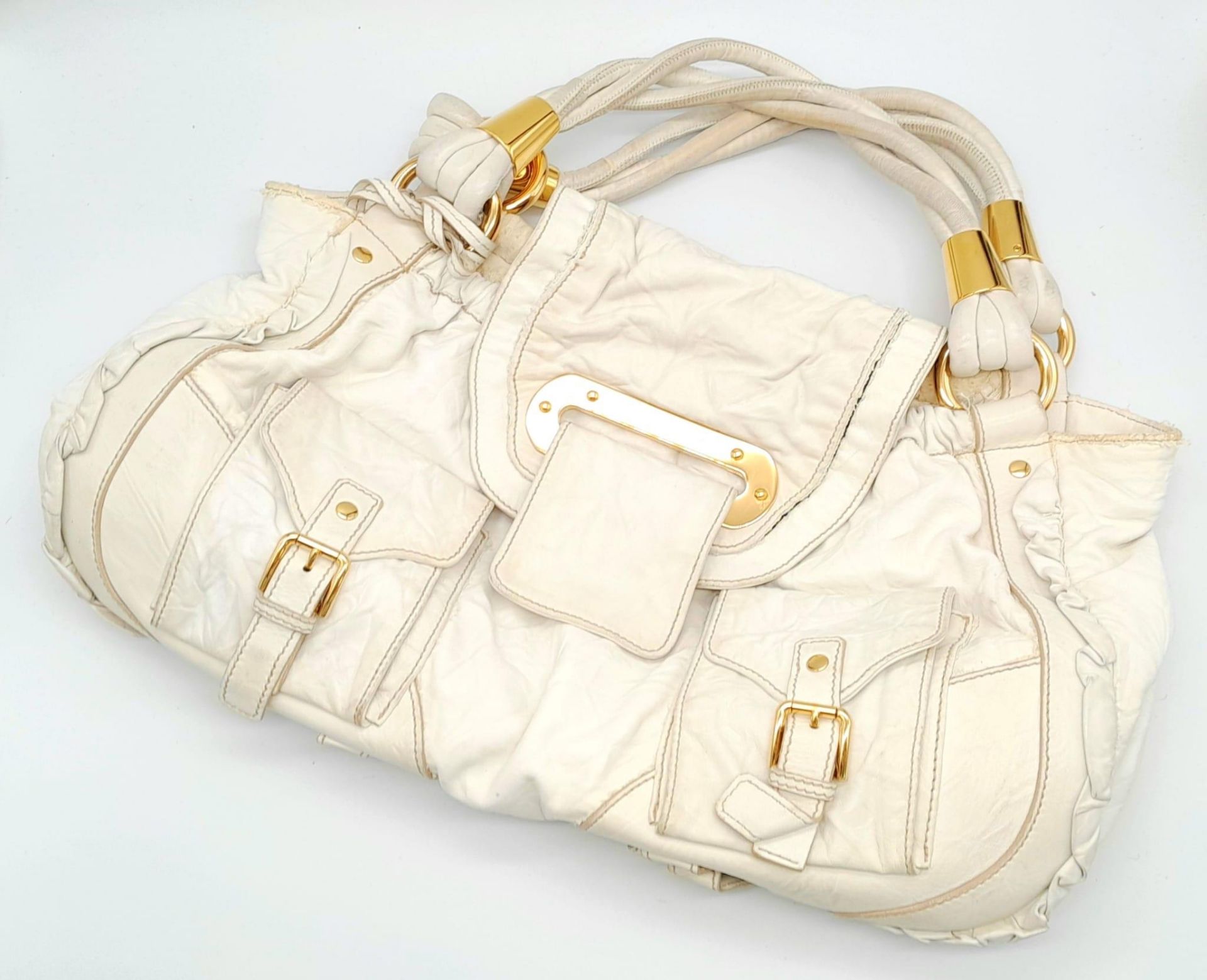 A Dolce and Gabbana Vintage Anniversary Handbag. White leather exterior with twin pockets. Gold tone - Image 2 of 10