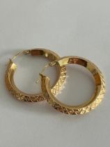 Pair of 9 carat GOLD HOOP EARRINGS Having attractive chased pattern to both sides. 2.75 cm diameter.