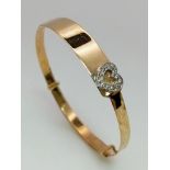 A 9K Yellow Gold Childs White Stone Heart Expandable Bangle. 2.32g weight.