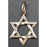 A 9K Yellow Gold Star of David Pendant. 3cm. 1.15g weight.