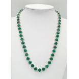 An Emerald Gemstone Tennis necklace - Set in 925 Silver. 50 cushion cut emeralds. 35.27g total