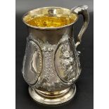 AN EARLY VICTORIAN SILVER TANKARD MADE BY ADEY B SAVORY IN LONDON WITH INCREDIBLE HAND CHASED