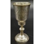 AN ANTIQUE SILVER RUSSIAN KIDDUSH CUP , HAND ENGRAVED . 44.5gms 10cms