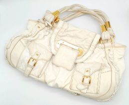 A Dolce and Gabbana Vintage Anniversary Handbag. White leather exterior with twin pockets. Gold tone