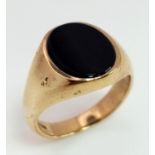 A 9K Yellow Gold Onyx Signet Ring. Size N. 6.05g total weight.