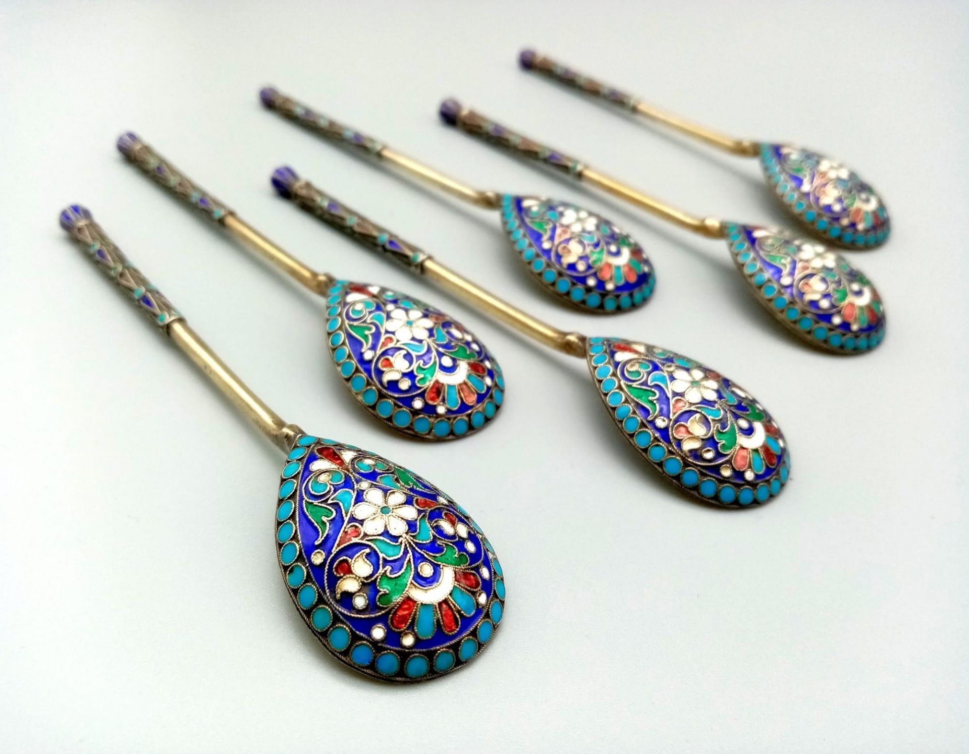 Six silver gilt Russian cloisonné enamel decorated teaspoons with original case. A beautiful set