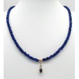 A Sapphire Small Bead Necklace with Diamond and Sapphire Hanging Decoration. 0.07ct diamond. 14k