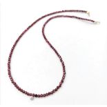 A Red Ruby Small Bead Necklace with White Diamond Decoration with 14K Gold Clasp. 40cm.