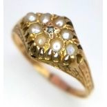 A VINTAGE 15K YELLOW GOLD WITH SEED PEARL AND OLD CUT DIAMOND RING, WEIGHT 2.1G SIZE N.