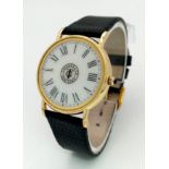 A Vintage 14K Gold Cased Tiffany and Co Ladies 'No Hands' Watch. Black leather strap. 14k gold