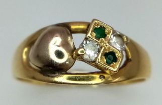 An 18K Yellow Gold, Diamond and Emerald Ring. Four stone and heart decoration. Size N. 2.68g total