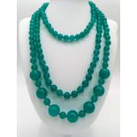 A Light Blue Jade Rope Necklace with Jade Beads Ranging from 8mm to 14mm. Can be worn in different