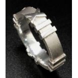 A Sterling Silver Atlas Roman Numeral Ring Marked Tiffany & Co 2006 Size L. The ring weighs 4.14