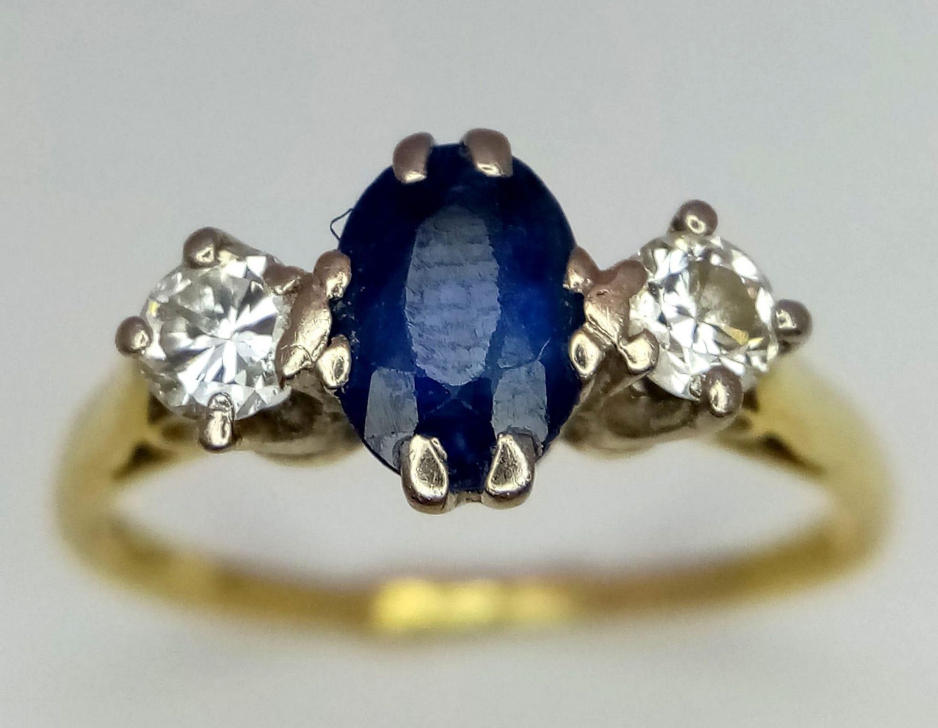 18kt Yellow Gold Diamond & Sapphire 3 Stone Ring. 0.65ct Oval Sapphire 0.20ct Diamonds W: 2.2g - Image 2 of 4