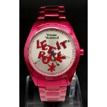 A Vivienne Westwood Shocking Pink Ceramic 'Let it Rock' Quartz Watch. 35mm case. In working order,