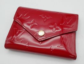 Louis Vuitton Wallet Victorine in Cherry Red. Stylish Monogram Vernis Cerise patterning, gold tone