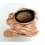 A very glamorous, with a unique free-form design, sterling silver and rose gold filled ring, with an