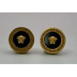 A very desirable VERSACE gold plated stud earrings with the iconic Medusa symbol. Diameter: 11 mm.