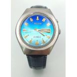 Ice Blue Dial Automatic Ricoh Gents Watch. Blue leather strap. Stainless steel case - 38mm. Blue