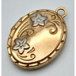 A 9 K yellow gold locket, dimensions: 19 x 13 x 5 mm, weight: 1 g.