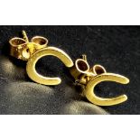 A Pair of 9K Yellow Gold Horse-Shoe Stud Earrings. 0.55g total weight.