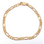 A 9K GOLD FIGARO LINK BRACELET . 4.3gms 18cms