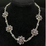 A LOVELY SILVER PURPLE STONE SET FLOWER NECKLACE, WEIGHT 43.4G AND 42CM LONG APPROX