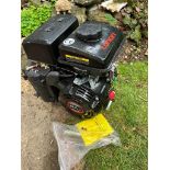 A BRAND NEW MOWER ENGINE IN GOOD WORKING ORDER.