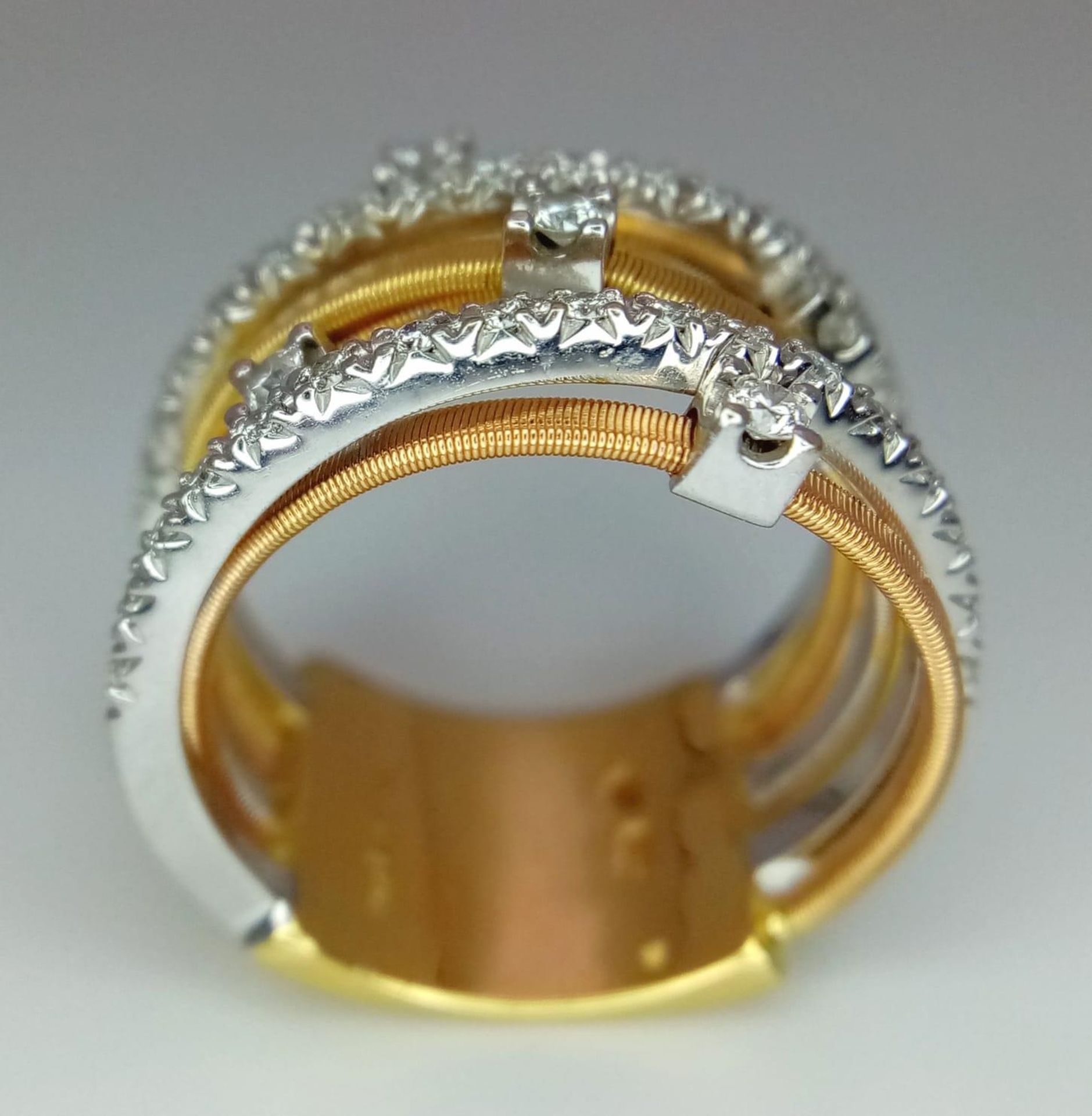An Italian 18K Yellow and White Gold Diamond Orbital Ring. Front band of gold interspersed with - Bild 6 aus 10