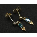 A Pair of 14K Yellow Gold Fancy Blue Diamond Earrings. 0.30ctw. 1.05g total weight.