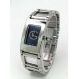 A polished, stainless steel, ladies GIVENCHY-Paris watch, rectangular case 26 x 17 mm, dark blue