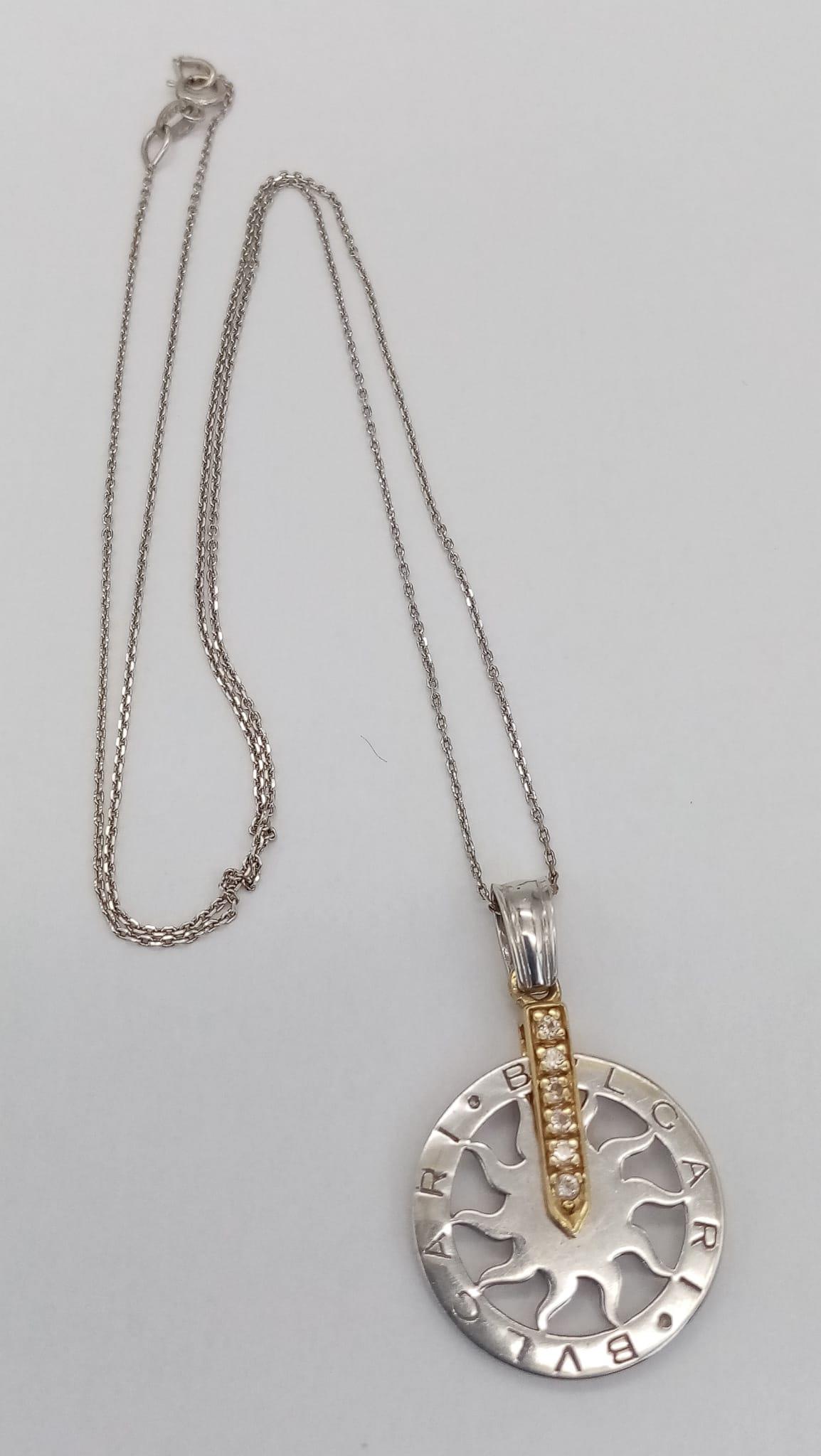 An 18 K white gold chain necklace with a BULGARI 18 K white and yellow gold pendant carrying six - Image 3 of 6