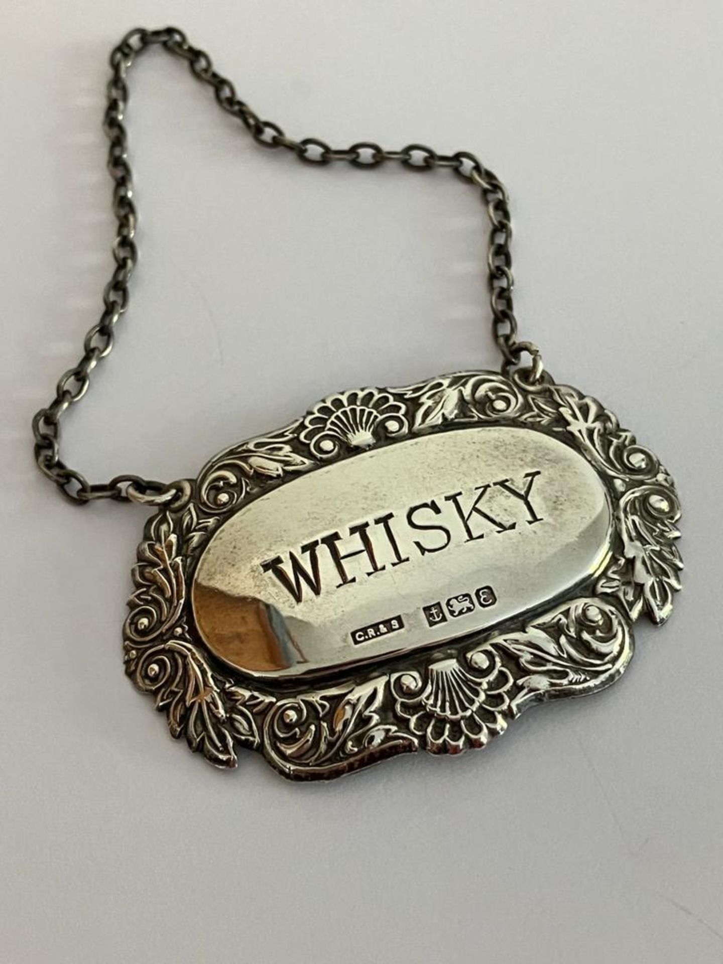 Vintage SILVER DECANTER LABEL for WHISKY. Having attractive SILVER surround with Shell and Scroll